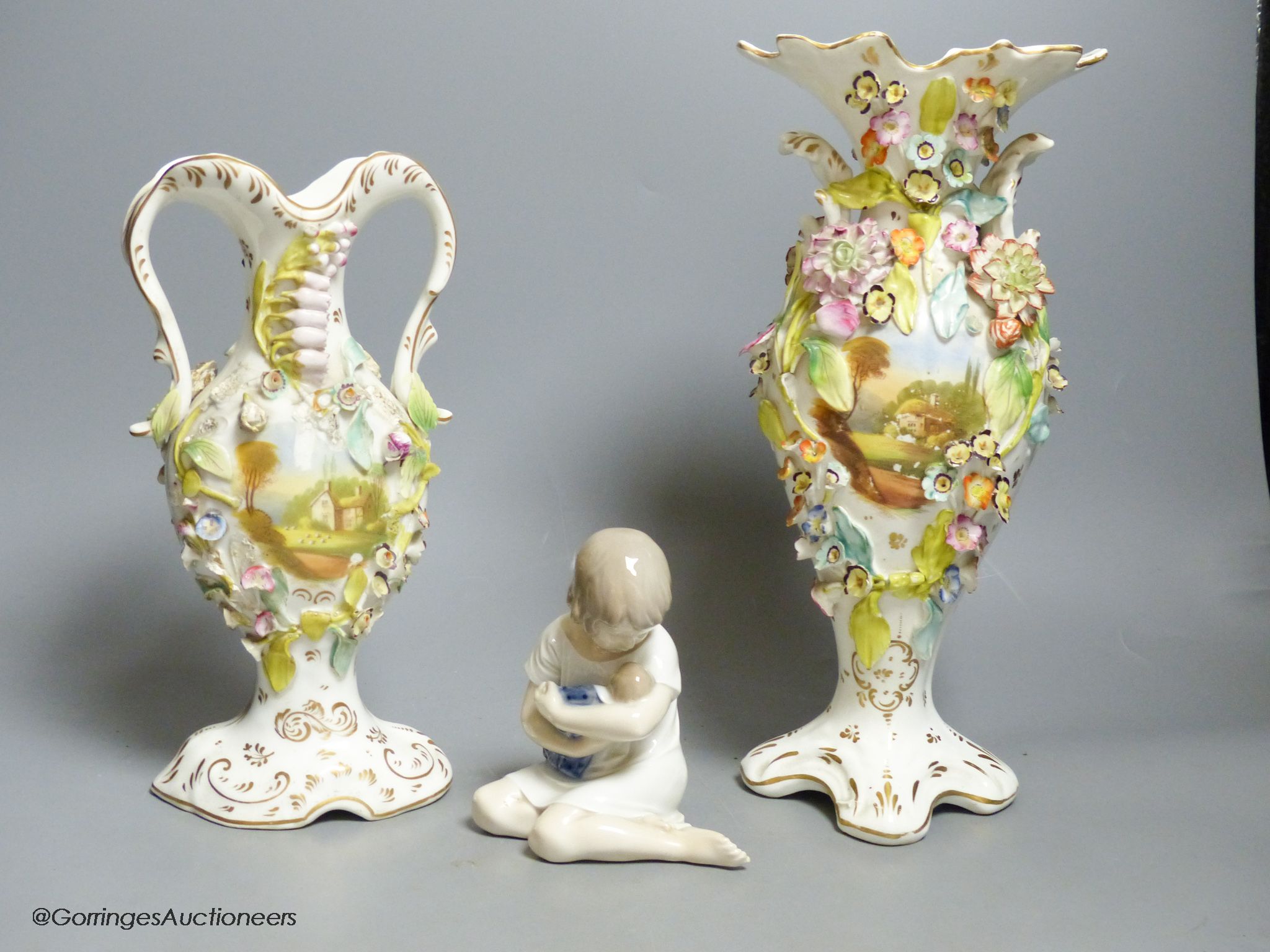 A Royal Copenhagen figure and a pair of Coalport style vases, tallest 31cm